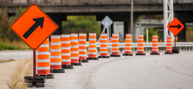 Orange cones indicating roadwork ahead.