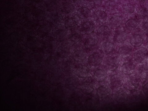 Una toma de cerca de un fondo abstracto de   color morado o violeta con negro con un degradado ligero desenfocado