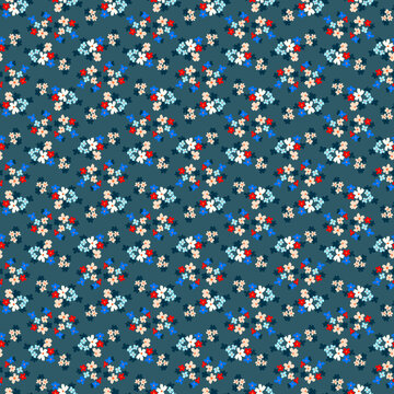 Ditsy florals Small abstract colorful flowers on a gray - blue background Simple colorful floral pattern in a modern minimalist, cartoon style Flat design