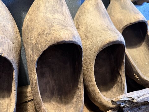 Wooden clogs displayed on a shelf - Sabots de bois expos&eacute;s sur une &eacute;tag&egrave;re