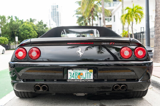Miami, Florida, USA - July 27, 2025: Ferrari F355 Spider 1996 convertible car. Convertible car Ferrari F355 Spider. Car Ferrari F355 Spider parked outdoor. Black convertible, corner view