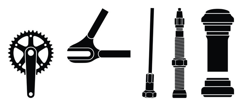 Bicycle component collection featuring a crankset pedal wrench and tire valve stems for mechanic workshops