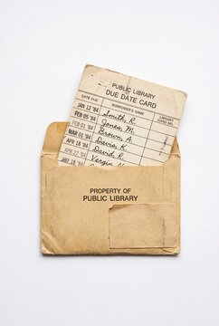 Vintage library due date card in envelope isolated on white