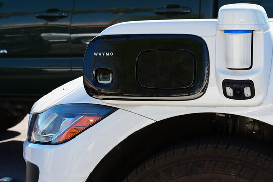 Sensor and camera system mounted on a Waymo autonomous vehicle, representing self driving technology, automated transportation, and advanced mobility infrastructure