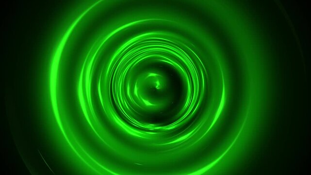 Bright glowing green circle shapes spiraling and expanding animation