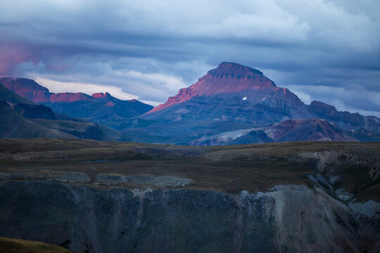 mountain range close up at twilight with sunlit peak