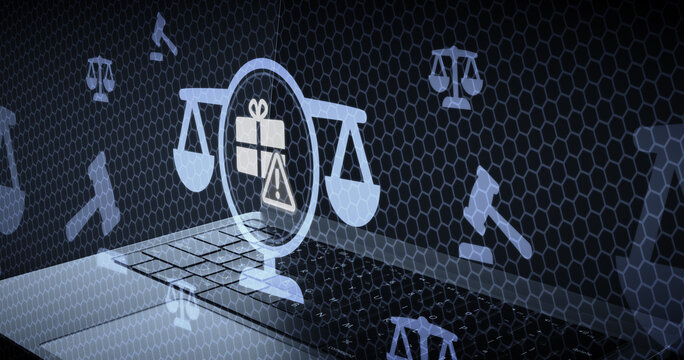 Digital concept of legal warning regarding gift and bribery legislation with scale and exclamation mark icons overlaying a laptop computer keyboard for corporate compliance