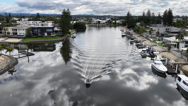 Aerial View of a Boat Navigating Luxury Gold Coast Canals