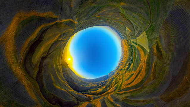 Inverse Little Planet Aerial View of Rural Landscape at Sunrise or Sunset