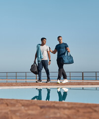 Fototapeta premium Men, friends and swimmer with gym bag for outdoor practice, sport or preparation together. Active, male people or athletes ready with equipment at swimming pool for fitness, competition or training