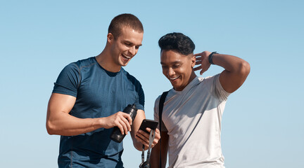 Fototapeta premium Happy men, fitness and swimmers with phone for social media, network or tracking performance. Active, male people or break with smile on smartphone for health tips, online advice or swimming guide