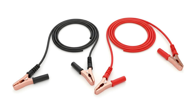 Jumper cables on white background automotive emergency kit red and black cables car battery booster