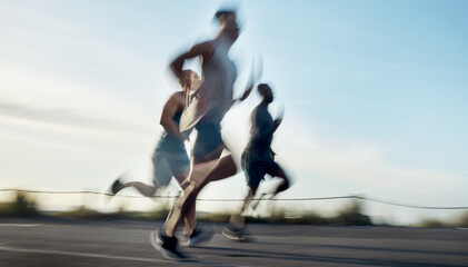 Fototapeta na wymiar Running, motion blur and race with friends outdoor for workout partner, health or exercise with speed. Wellness. training and runner group with people in nature for sports, support and competition