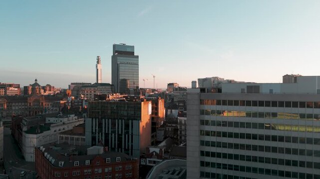 Aerial drone view of 103 Colmore Row skyscraper at sunrise, Birmingham, England