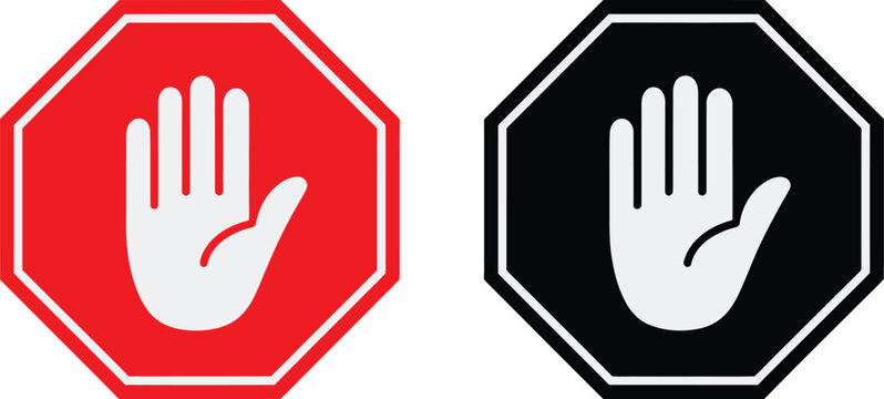 Red and black octagonal stop signs with hand symbol isolated on a white background