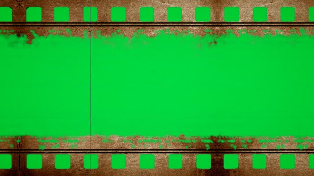Rusty Brown Aged Edge negative film strip on green screen chroma key background. rough antique overlay style stock footage for cinematic video editing and creative media projects. media template