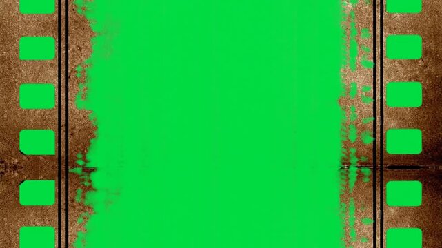 Metallic Oxidized Edge negative film strip on green screen chroma key background. industrial rough border style stock footage for cinematic video editing and creative media projec project