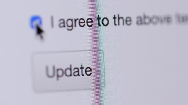 4K macro footage showing a user ticking the "I agree to the above terms" box and clicking the "Update" button below it.