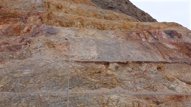 Vivid Strata In Mineralrich Geological Formations Demonstrate Variations. Colorful And Lively Layers Of Earth Demonstrate Mineral Diversity And Geological Variations Across Regions