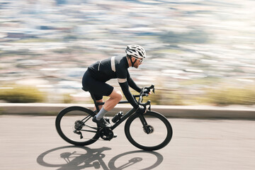 Obraz premium Fitness, bike or cyclist on road with motion blur, endurance training or speed in cardio workout. Fast, space or man outdoor with bicycle, physical activity or riding practice in sports hobby.