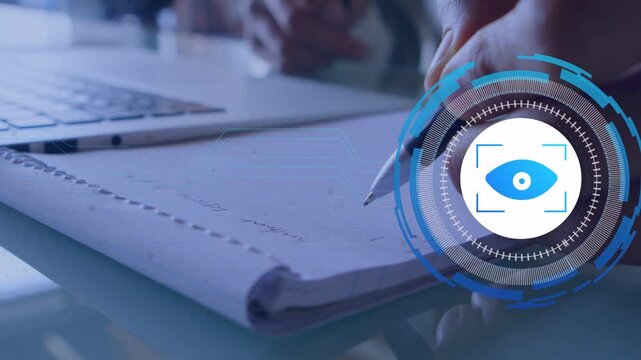 Right hand holding pen writing notebook starting tech HUD eye icon growing over pen while noting