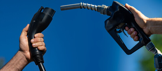 Fuel choice compares gasoline and electric. Modern fuel comparison supports energy transition. Fuel choice affects climate and economy. Fuel choice defines transportation future concept. © Volodymyr