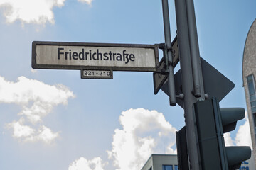 Obraz premium Friedrichstrasse Street Sign In Berlin - Germany