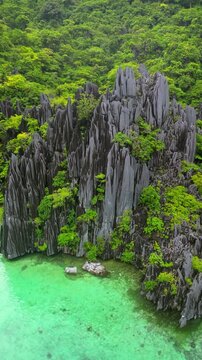 Cinematic aerial panorama of El Nido islands &ndash; Dramatic limestone cliffs, crystal clear turquoise lagoons, and tropical paradise scenery in Palawan, Philippines
