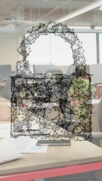 Vertical video: 3D lock wireframe building over desk after scan, then bursting to reveal desk