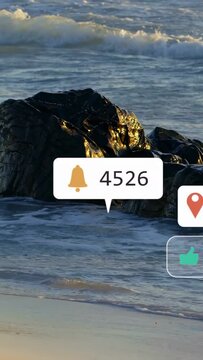 Vertical video: Dark rock centering, waves lapping, bubbles appearing after alerts, showing counts