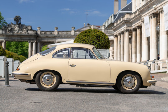 Nancy, France - May 9th 2026 : View on a beige Porsche 356C parked on a street.
