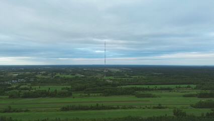 Fototapeta premium Global connection technology tower in wide landscape