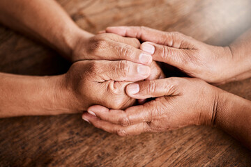 Fototapeta premium Empathy, comfort and senior couple with hand holding in home for grief, assurance and compassion. Retirement, above and elderly people with understanding for loss, sympathy and console for healing