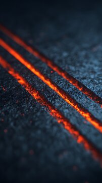 Close-up of glowing molten lava flowing through cracks in dark volcanic rock, highlighting fiery orange and red hues against a rough black surface.