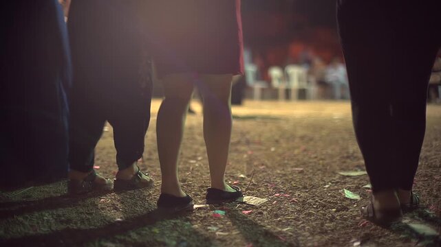 Drum leads halay dance at night wedding in Sivas Turkey with rhythm, crowd folk tradition. Percussion drives line dancers through village celebration, cultural music scene communal heritage.