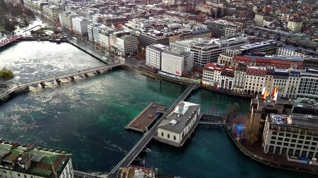 Aerial Perspective of Rhone River and Historic Bridges in Geneva City Center Switzerland