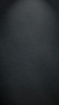 Abstract dark grey brushed metal texture with subtle light gradient
