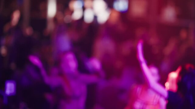Cinematic shot showcasing lively nightclub environment with dancing figures and vivid neon illumination