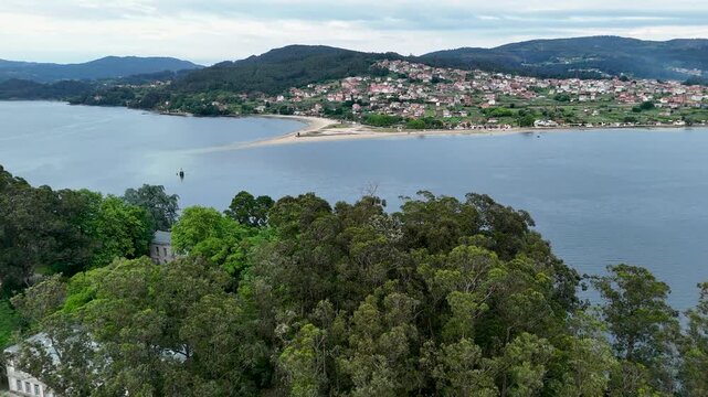 Aerial view flying away from san simon island in ria de vigo