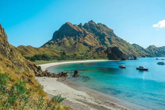 Traveler with amazing view of Landscape at Padar island in Komodo National Park, Indonesia