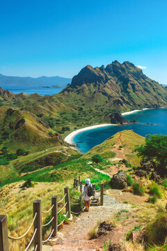 Traveler with amazing view of Landscape at Padar island in Komodo National Park, Indonesia