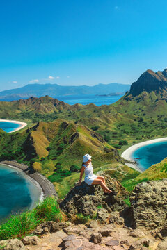 Traveler with amazing view of Landscape at Padar island in Komodo National Park, Indonesia