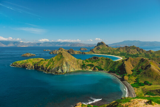Traveler with amazing view of Landscape at Padar island in Komodo National Park, Indonesia