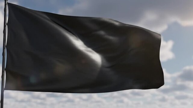 Black flag billowing in the wind against a cloudy sky background, symbolizing mourning and revolt