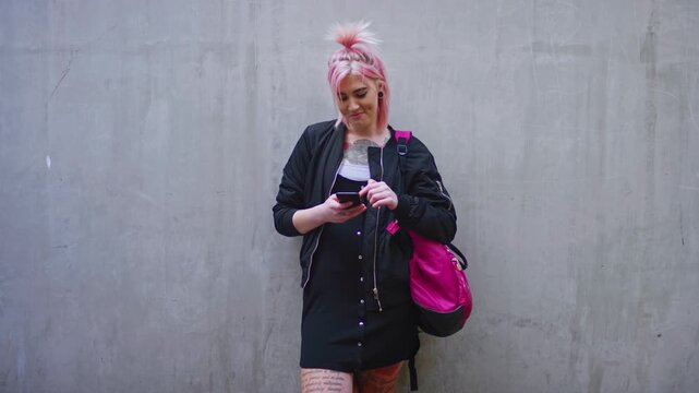 Outdoor, student and woman with phone, reading fashion magazine and mockup space for notification. Campus, smile and person with tech for gen z trend research, wall or scroll for creative inspiration