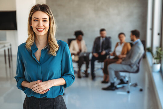 Successful executive standing proudly in office, representing business growth, partnership