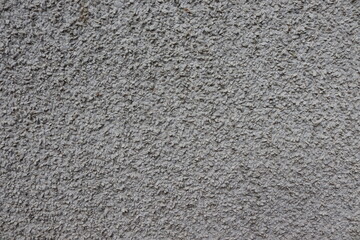 Grey Pebble Dash Wall Texture Background with Rough Exterior Surface © matthew