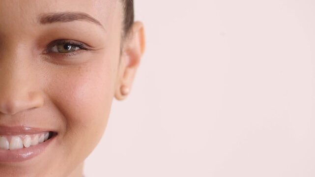 Happy woman, face and skincare with makeup for beauty cosmetics on a studio background. Portrait, half or female person with smile for cosmetology, anti aging salon or spa day on mockup space