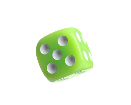Green game dice on white background