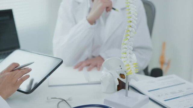 Medical Consultation for Spine Health Clinic Setting Informative Session Professional Environment Close-Up View Backbone Doctor Concept